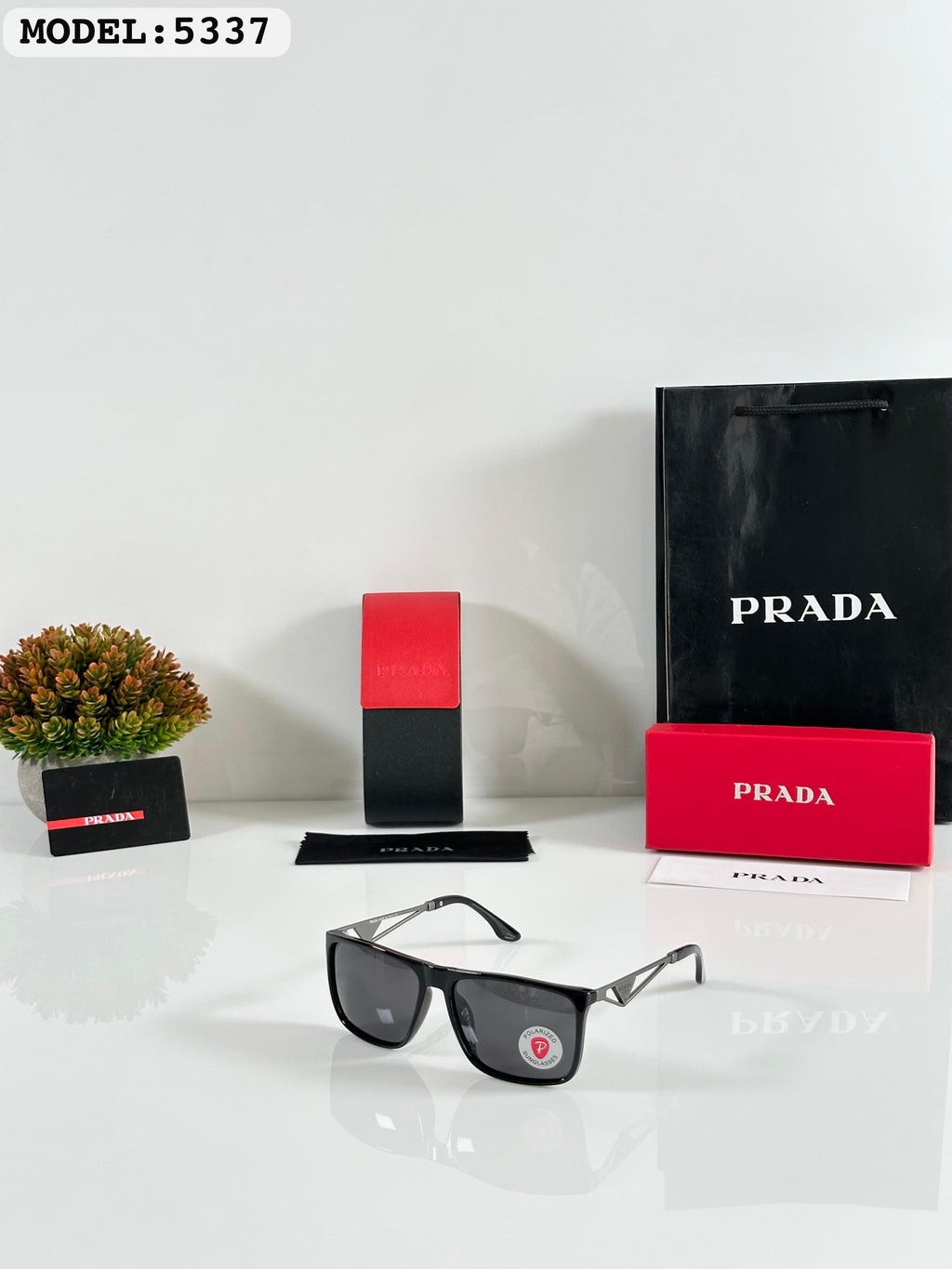 Pra/da polarized sunglasses with imported brand kit